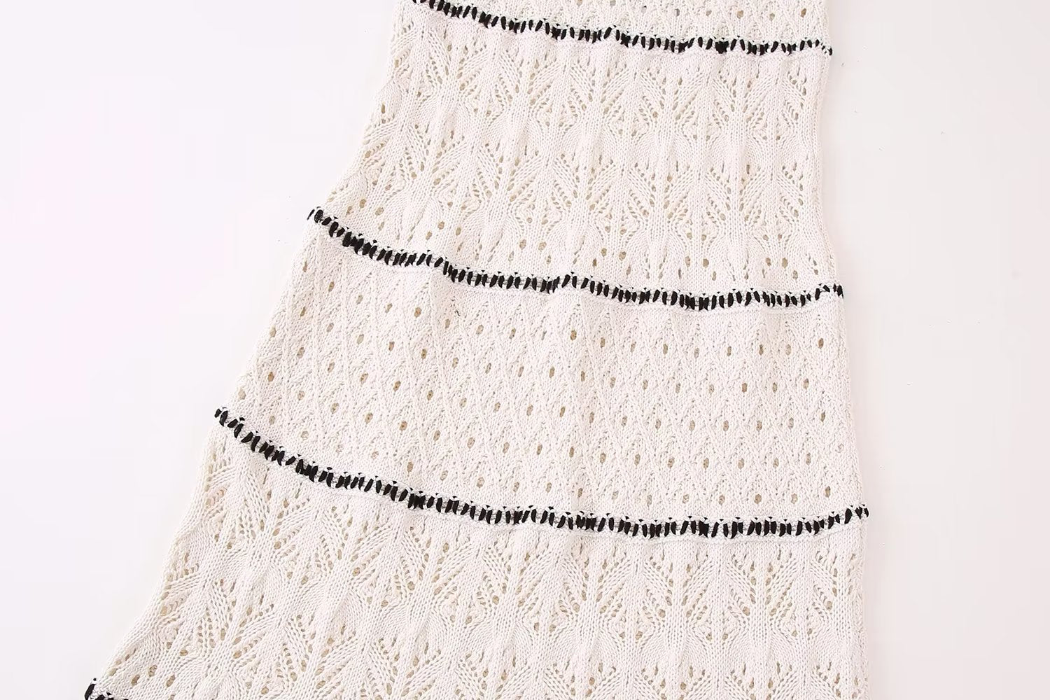 ELEGANT KNITTED, CURTAIN DRESS.